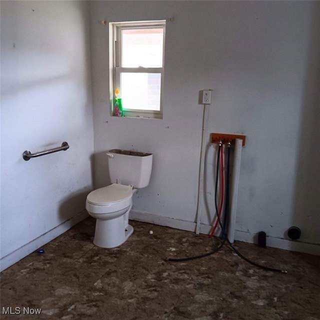 bathroom featuring toilet