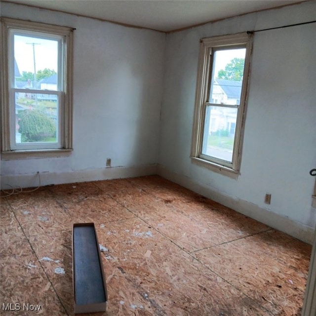 spare room with a wealth of natural light