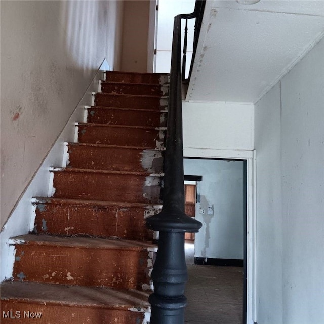 stairs with a wood stove