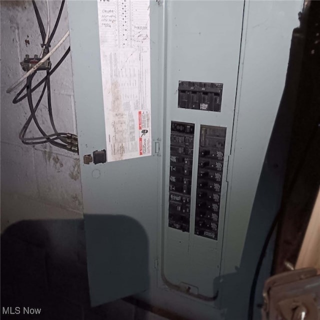 utility room featuring electric panel