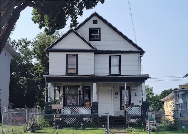 view of property featuring a porch