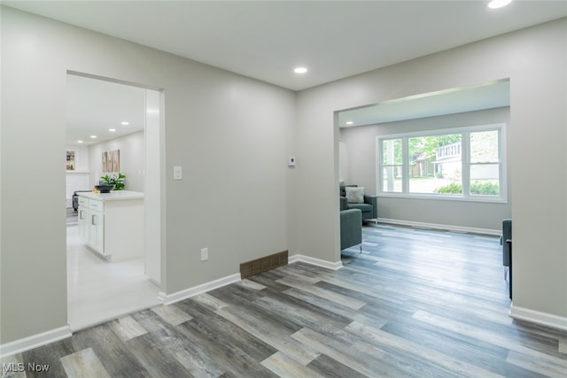 unfurnished room featuring wood-type flooring