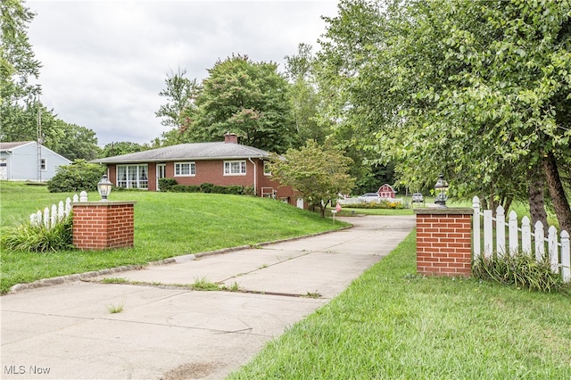 exterior space featuring a front lawn