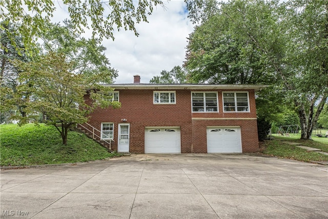 view of front of property featuring a garage