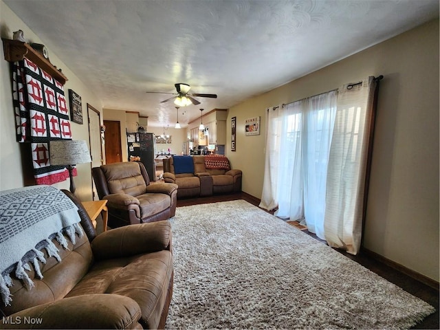 living room with ceiling fan