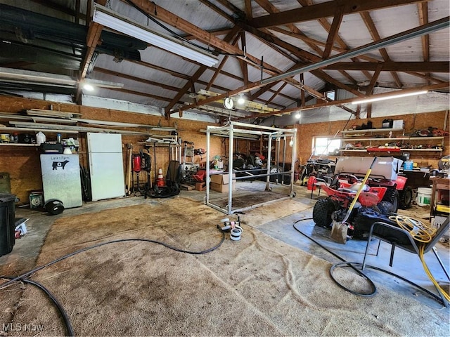 garage with white refrigerator