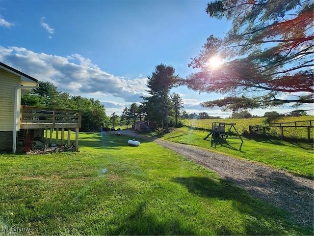 view of yard with a deck