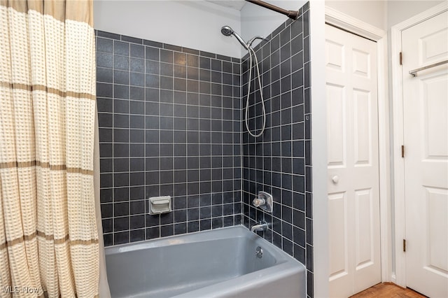 bathroom featuring shower / bath combination with curtain