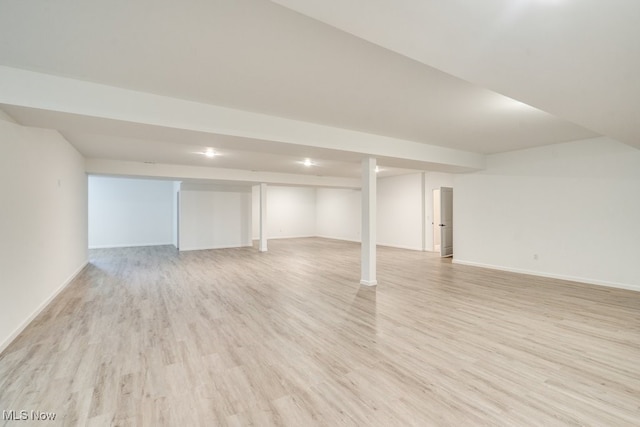 basement featuring light hardwood / wood-style floors