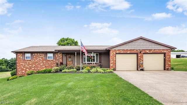 ranch-style house with a garage and a front lawn