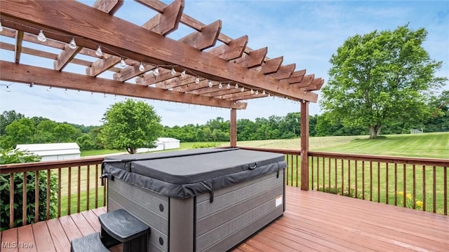 deck with a lawn, a pergola, and a hot tub