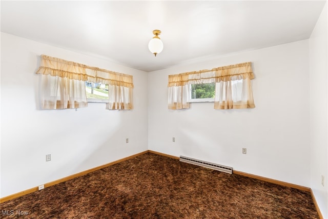 carpeted spare room with a wealth of natural light