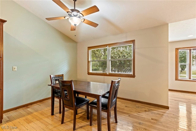 dining space featuring ceiling fan, light hardwood / wood-style flooring, and plenty of natural light