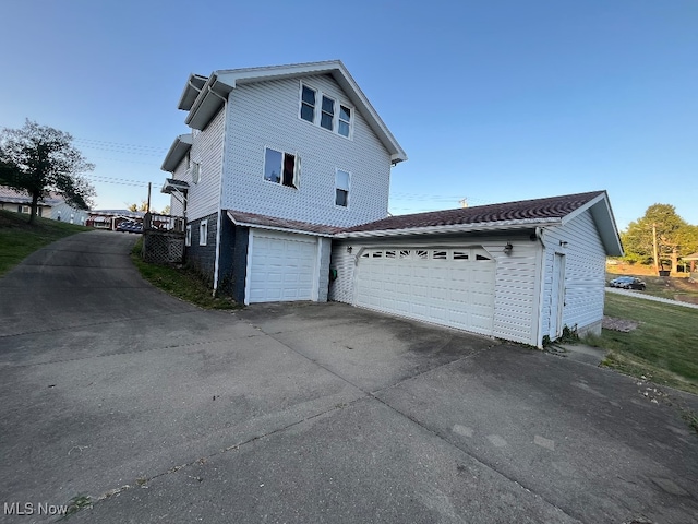 view of home's exterior featuring a garage