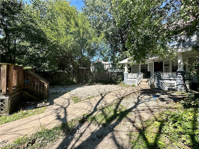 view of yard with a porch