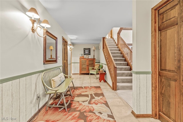 view of carpeted entrance foyer