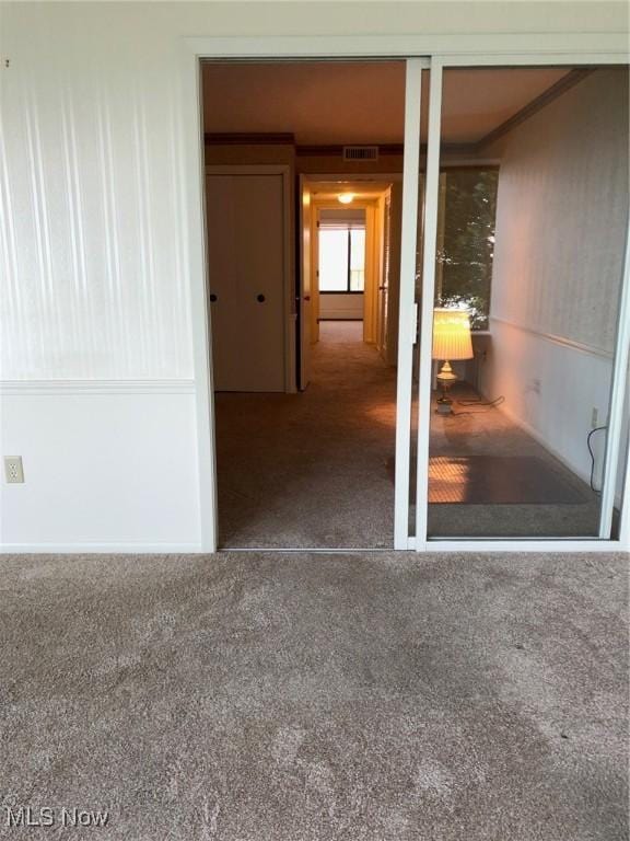 property entrance with visible vents