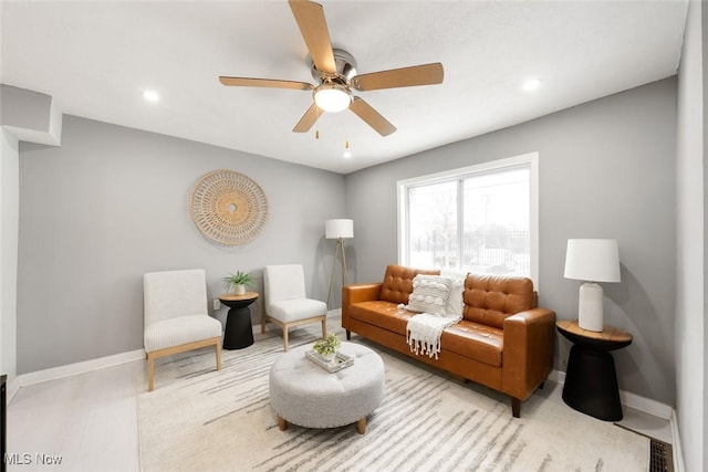 living room featuring ceiling fan