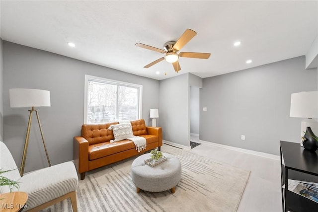 living room featuring ceiling fan