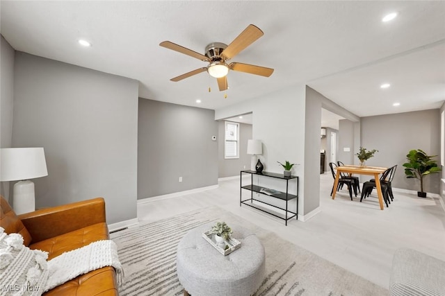 living room featuring ceiling fan