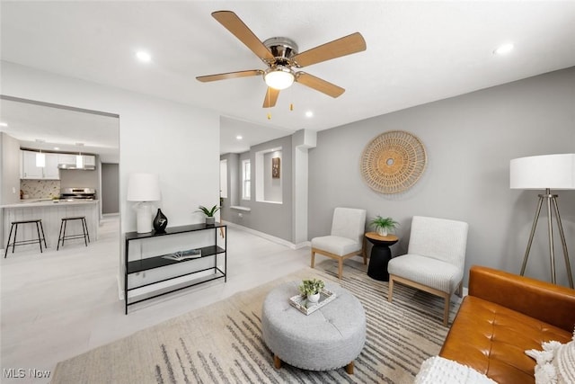 living room featuring ceiling fan