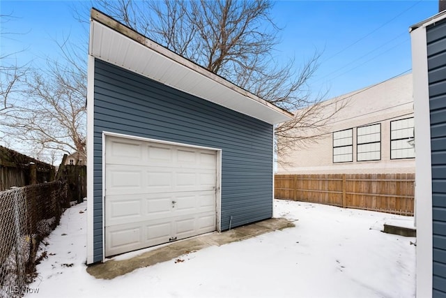 view of snow covered garage