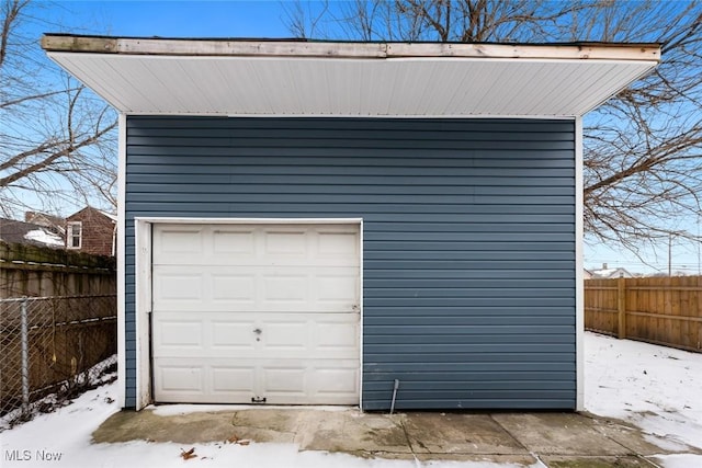 view of snow covered garage