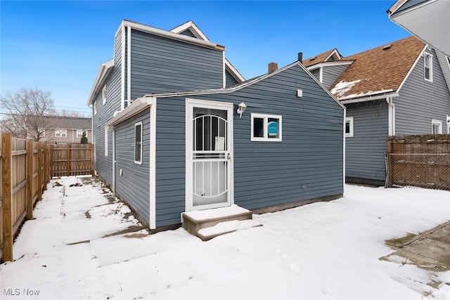 view of snow covered property