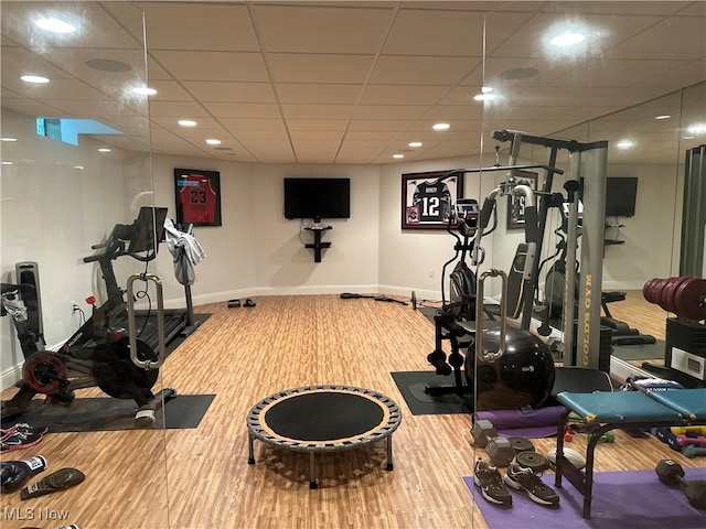 workout area with a drop ceiling