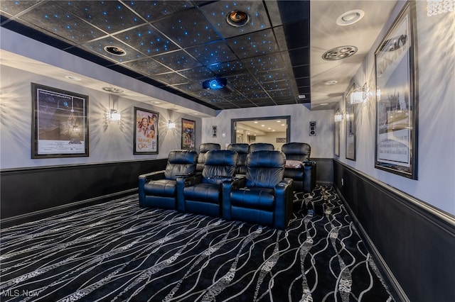 cinema room featuring carpet floors