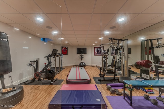 workout room with a drop ceiling