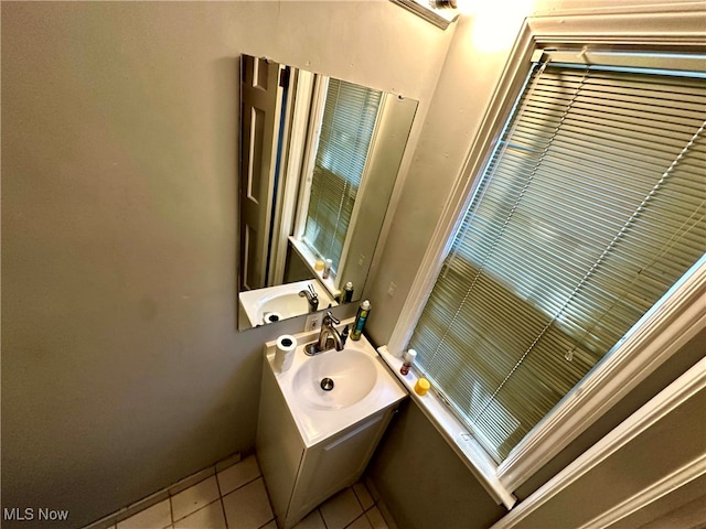 bathroom featuring tile patterned floors and sink