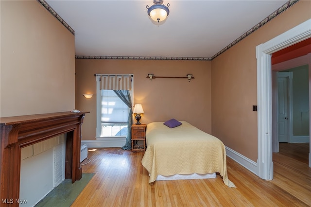 unfurnished bedroom featuring wood-type flooring