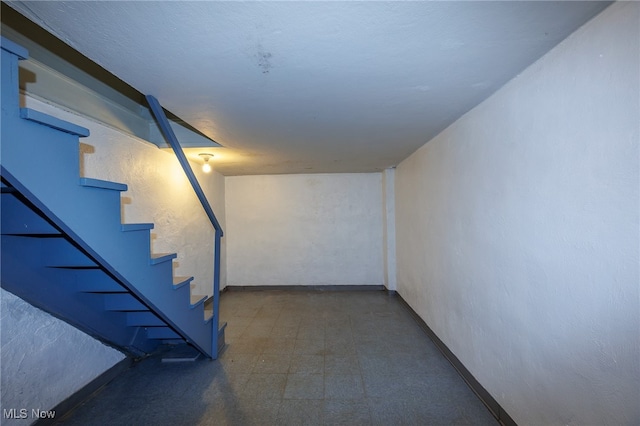 basement with tile patterned flooring