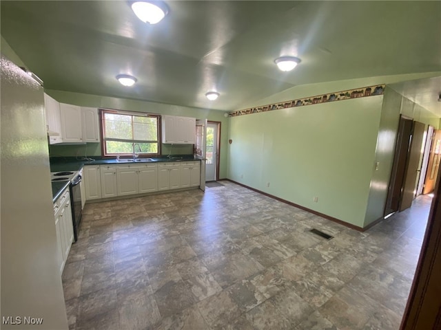 kitchen featuring white cabinets, vaulted ceiling, black range with electric stovetop, and sink