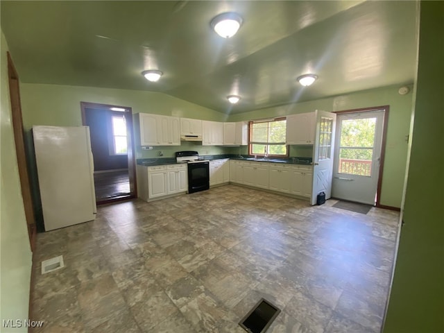 kitchen featuring white cabinetry, white appliances, plenty of natural light, and lofted ceiling