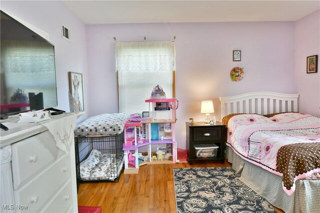 bedroom featuring light wood-type flooring