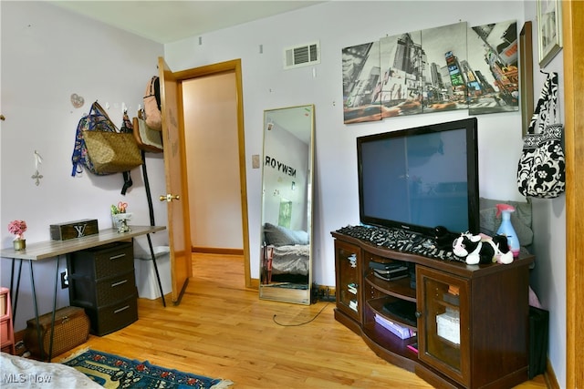 bedroom featuring light hardwood / wood-style floors