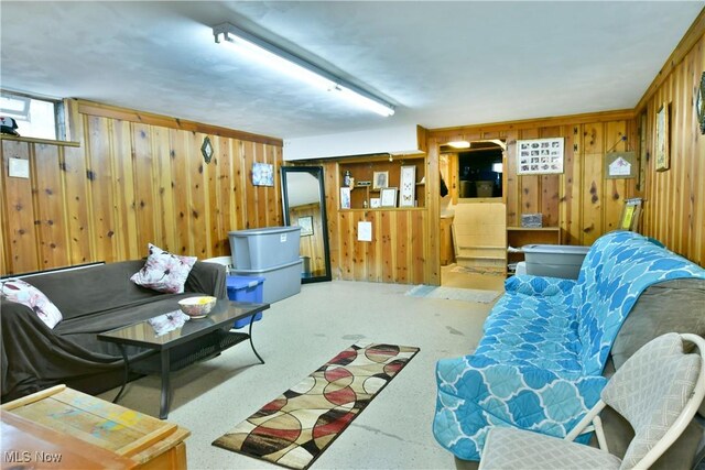 living room with wooden walls