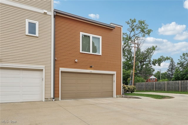 view of property exterior featuring a garage