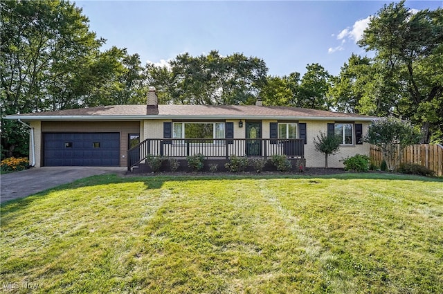 ranch-style house with a front yard and a garage