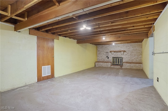 basement featuring a fireplace