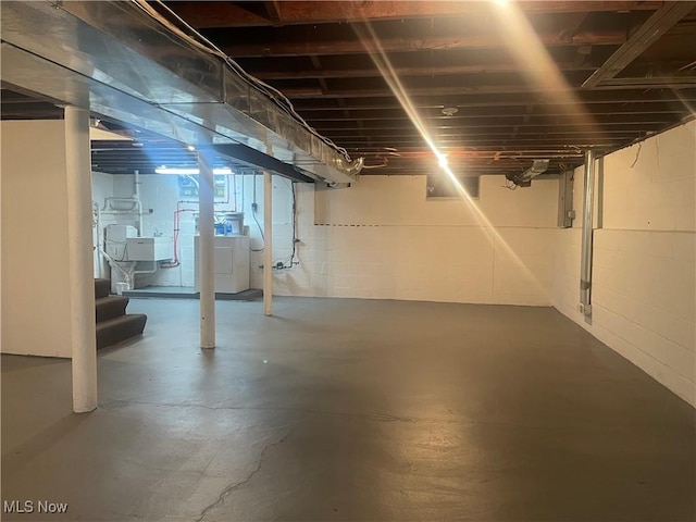 basement featuring independent washer and dryer