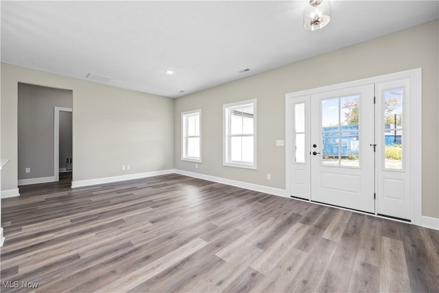 foyer with light hardwood / wood-style flooring