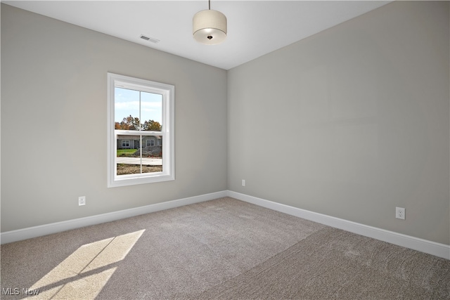 view of carpeted spare room