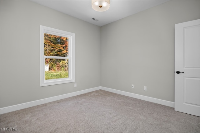 view of carpeted spare room