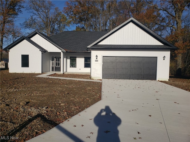 view of front of home with a garage