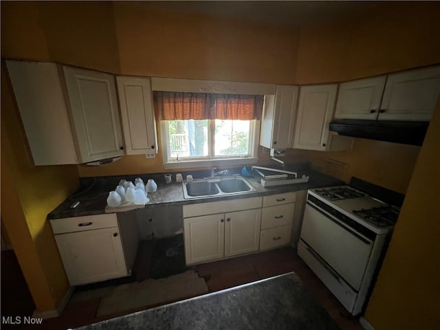 kitchen featuring white cabinetry, sink, and white range with gas cooktop