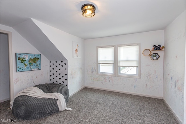 carpeted bedroom featuring vaulted ceiling