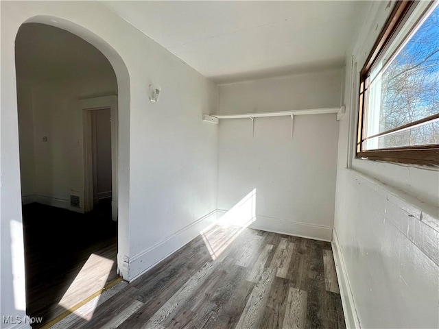 interior space with dark hardwood / wood-style flooring